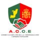 Logo de l'Association pour la Coopération Congo-Espagne (A.C.C.E.) représentant un écu divisé avec la carte du Congo et les armoiries de l'Espagne, surmontant une poignée de main fraternelle.